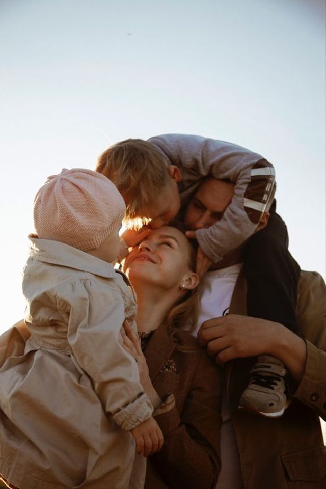 Loving parent hugging their child